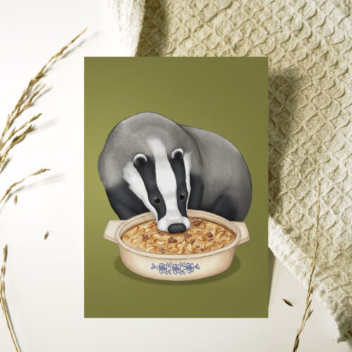 Kortti, jossa mäyrä syö makaronilaatikkoa