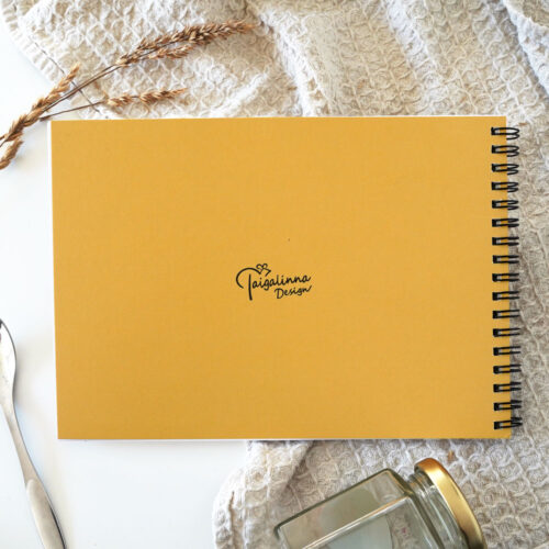 Reseptivihkon keltainen takakansi, jossa on Taigalinnan logo.