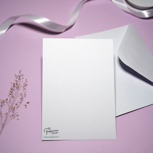 Postikortin tyhjä taustapuoli sekä kirjekuori.
