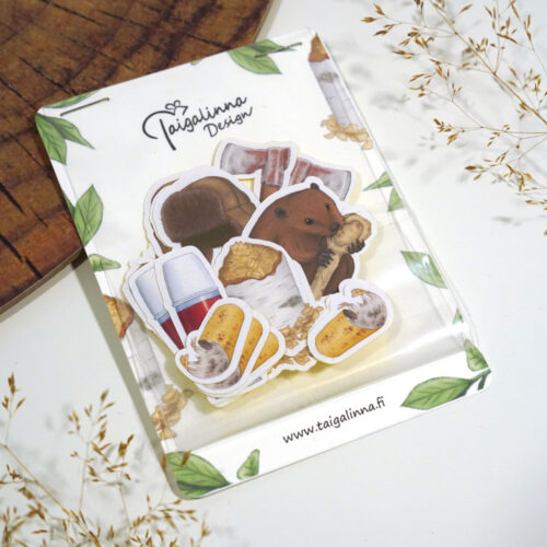 Pussillinen paperitarroja, joiden aiheina ovat puutyöt ja majava.